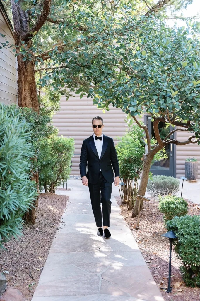 groom walking to location for first look