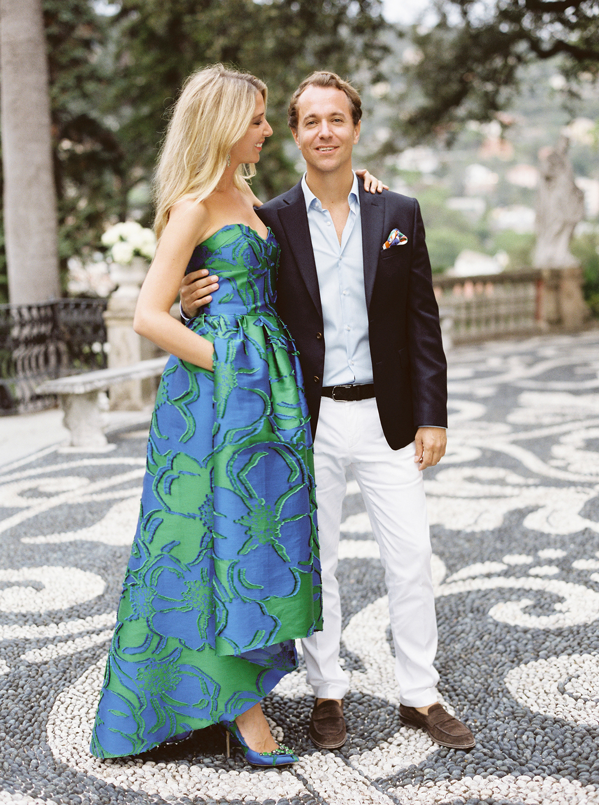 Stylish couple posing together on the mosaic terrace at Villa Durazzo Santa Margherita