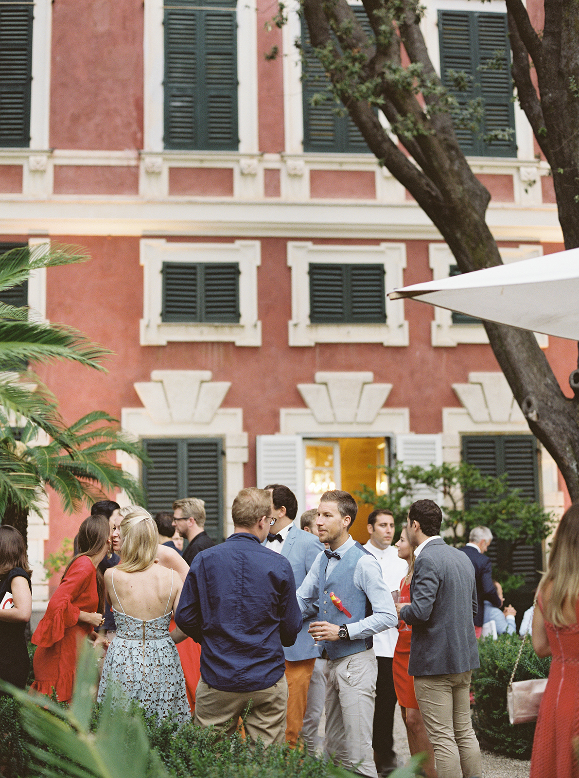 Wedding guests socializing during cocktail hour at Villa Durazzo Santa Margherita