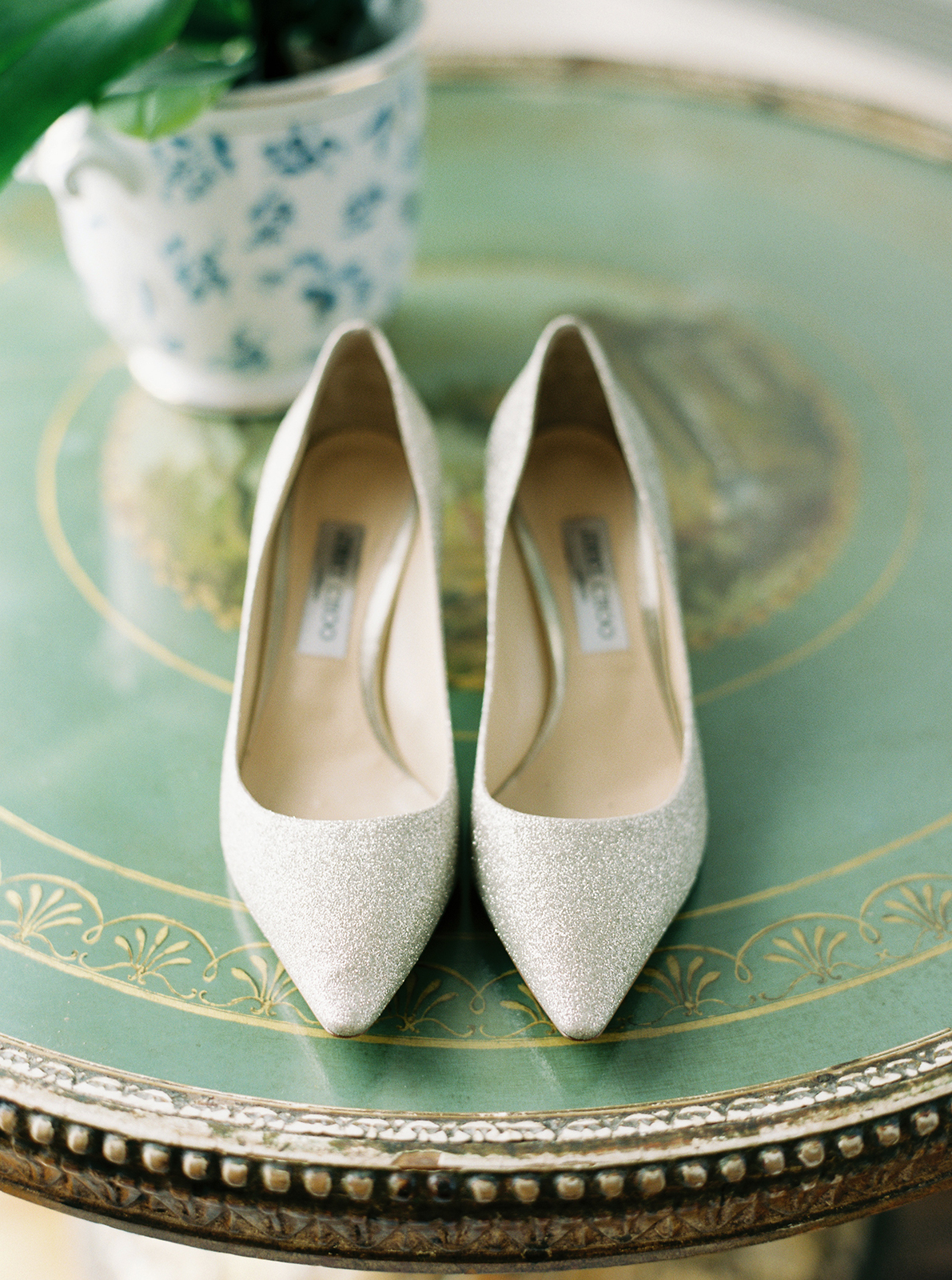 Bridal shoes styled on an antique table during wedding preparations at Imperiale Palace Hotel in Portofino
