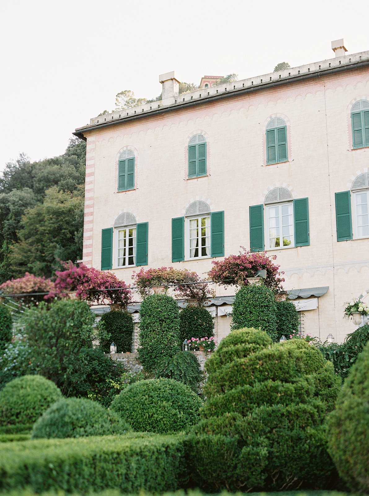 La Cervara Abbey wedding venue with historic villa façade and manicured gardens in Portofino, Italy