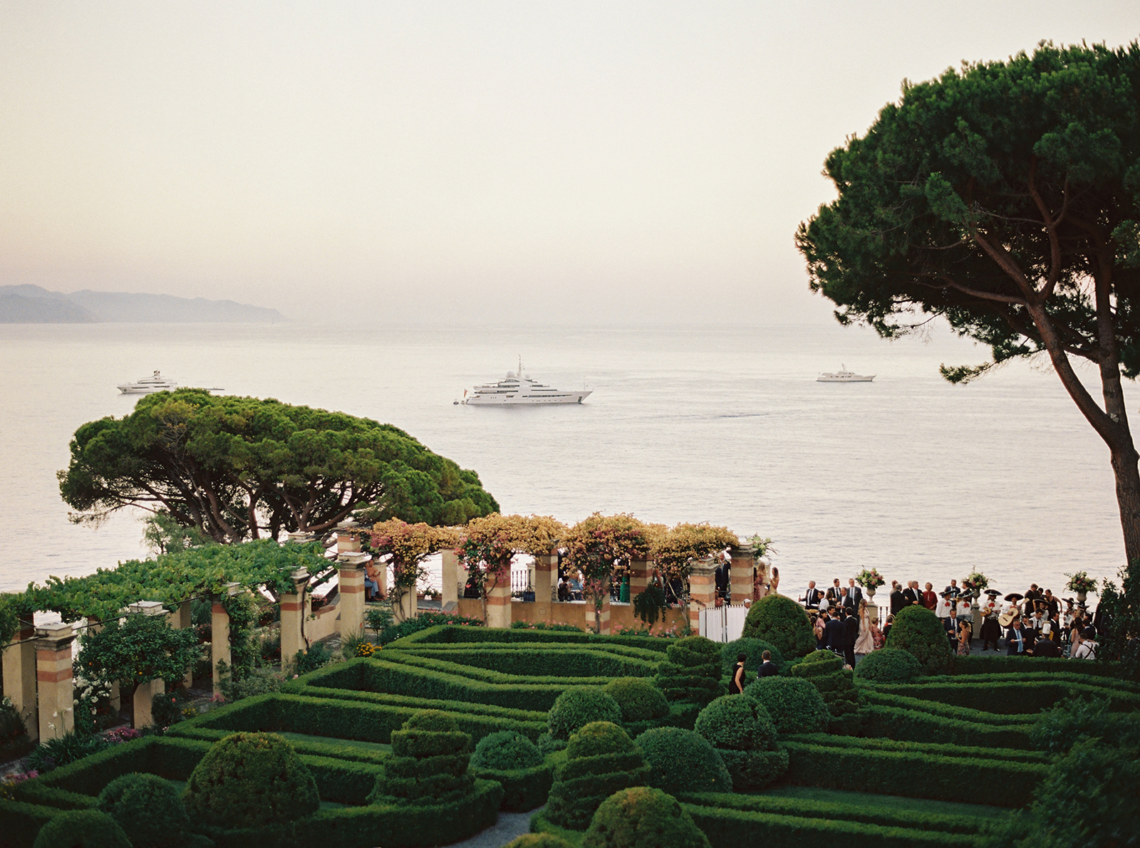 Panoramic view of La Cervara gardens set for a destination wedding ceremony overlooking the Mediterranean Sea