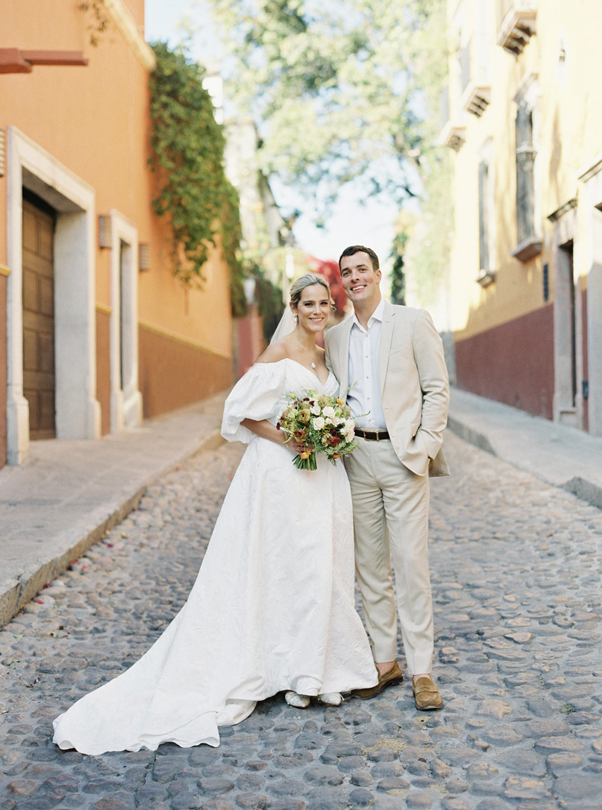 Wedding couple portrait on cobblestone street in San Miguel de Allende