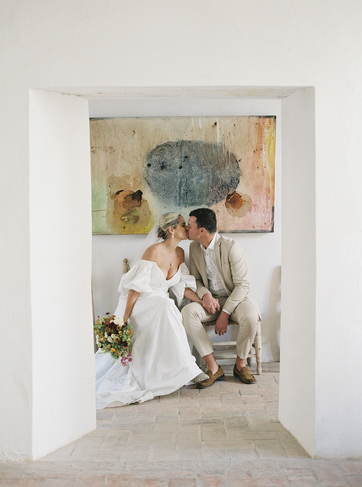 Wedding couple seated together at Casa de Sierra Nevada Belmond Hotel
