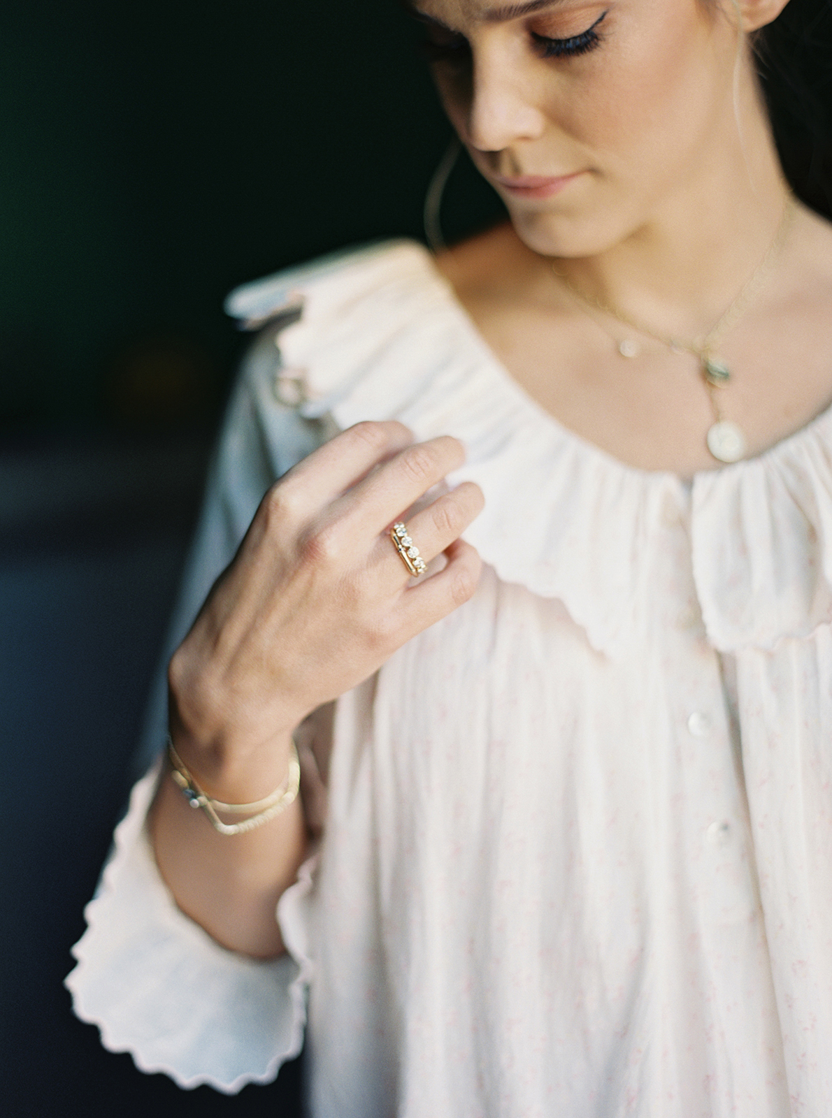 Bride showing engagement ring during wedding getting ready at Casa de Sierra Nevada