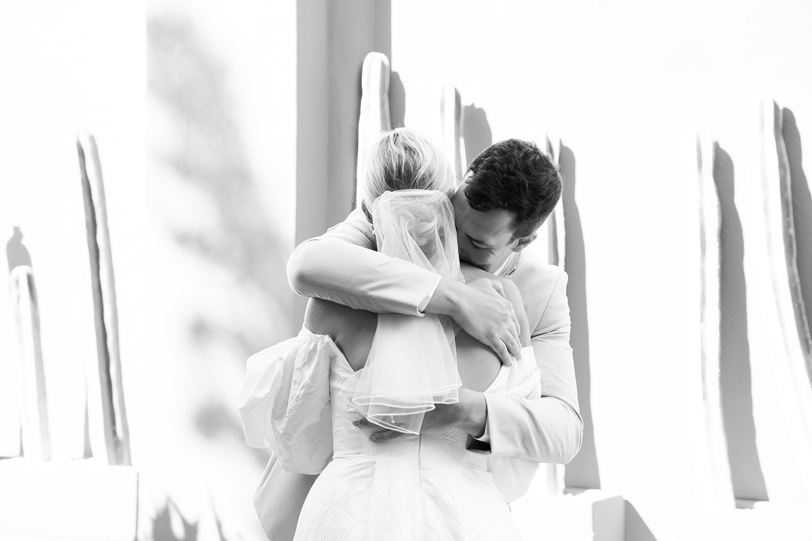 groom hugging his bride during first look in San Miguel de Allende