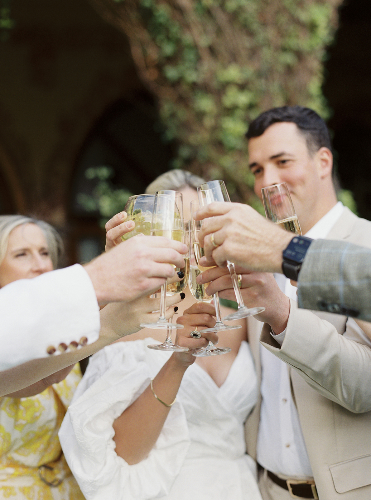 couple toasting with family members in casa de Sierra Nevada Belmont hotel