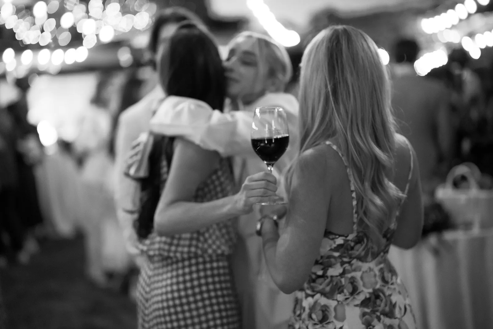 Guests hugging and celebrating together during a Healdsburg rehearsal dinner