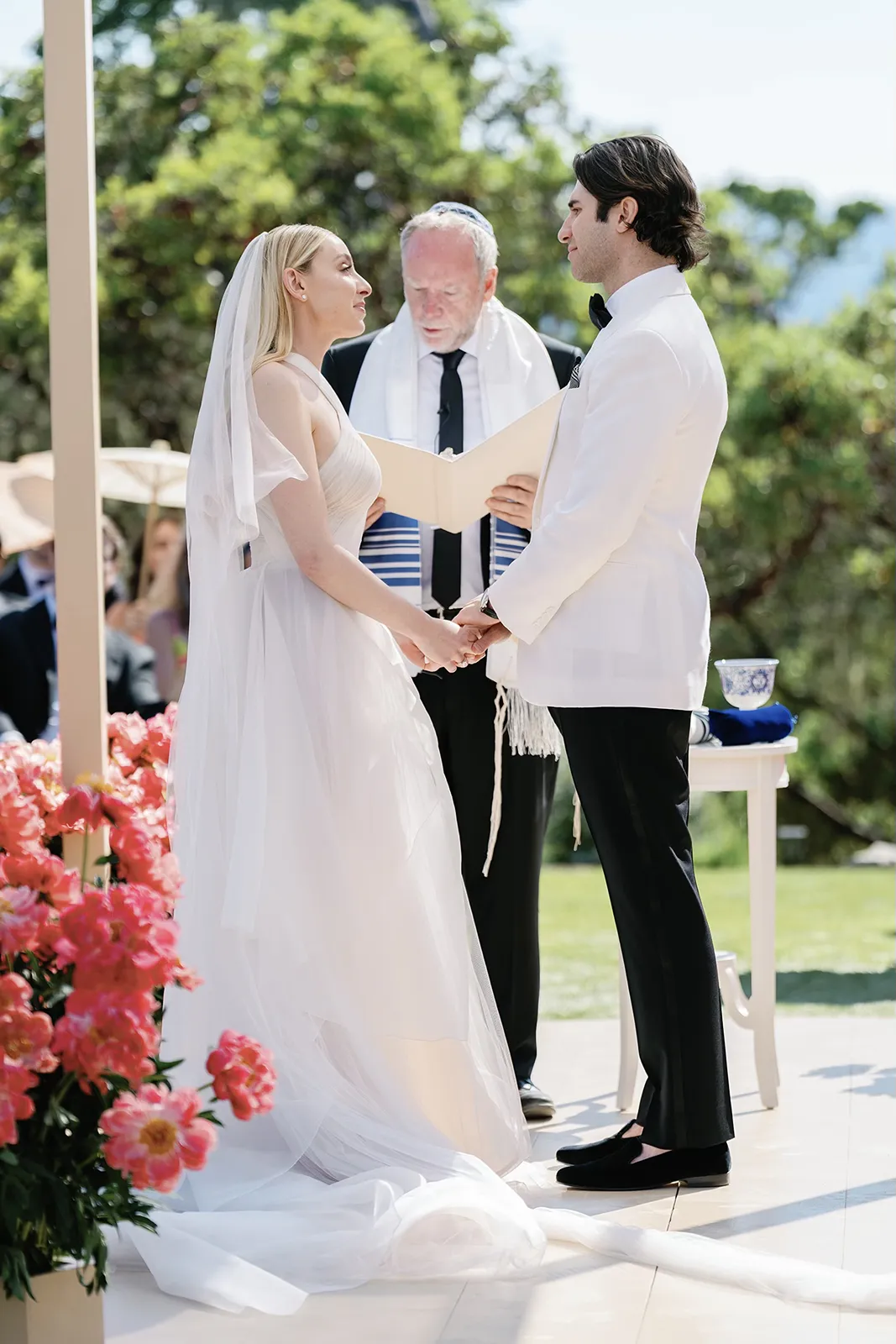 couple facing and smiling at each other during ceremony