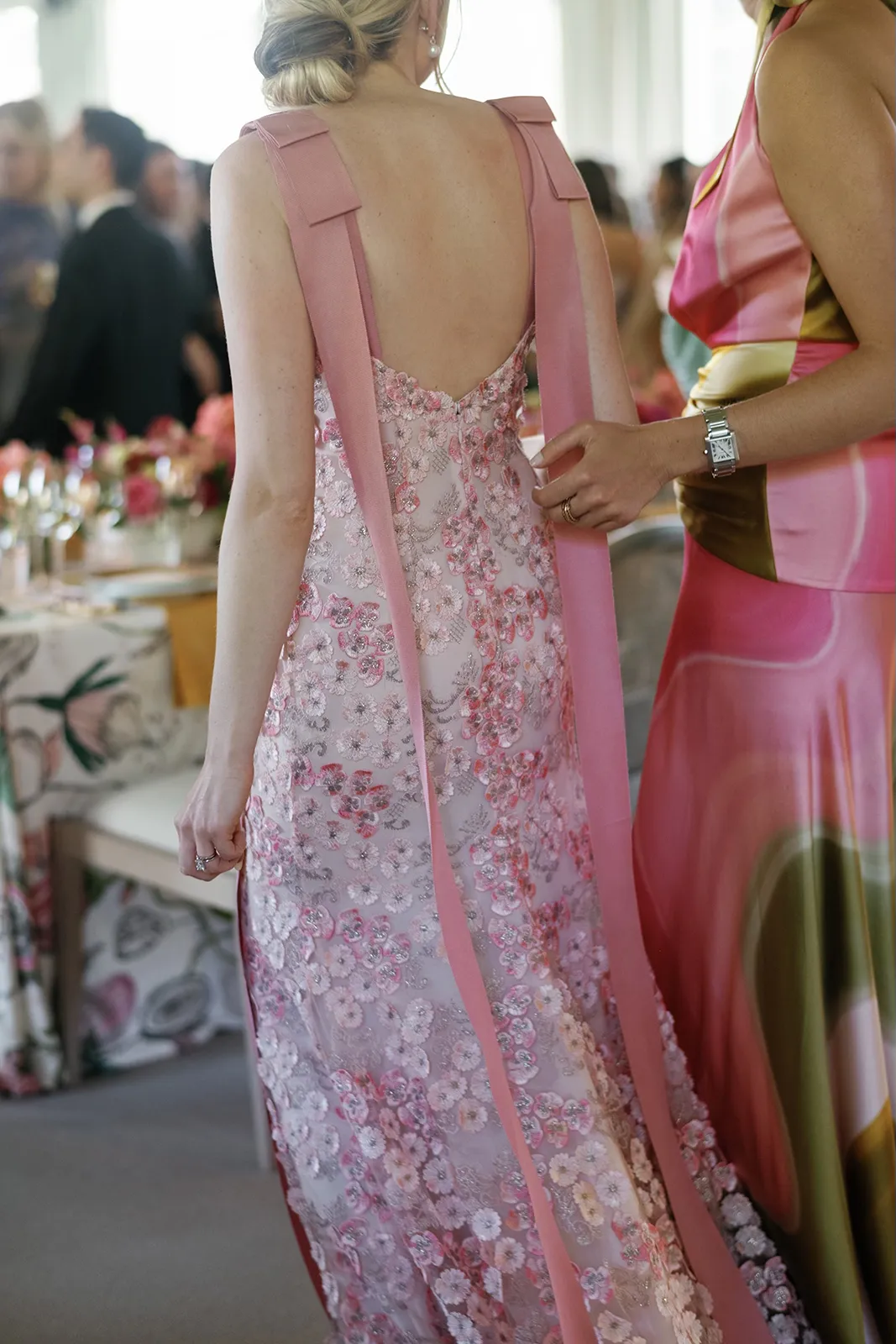 close-up of back of bride's pink reception dress