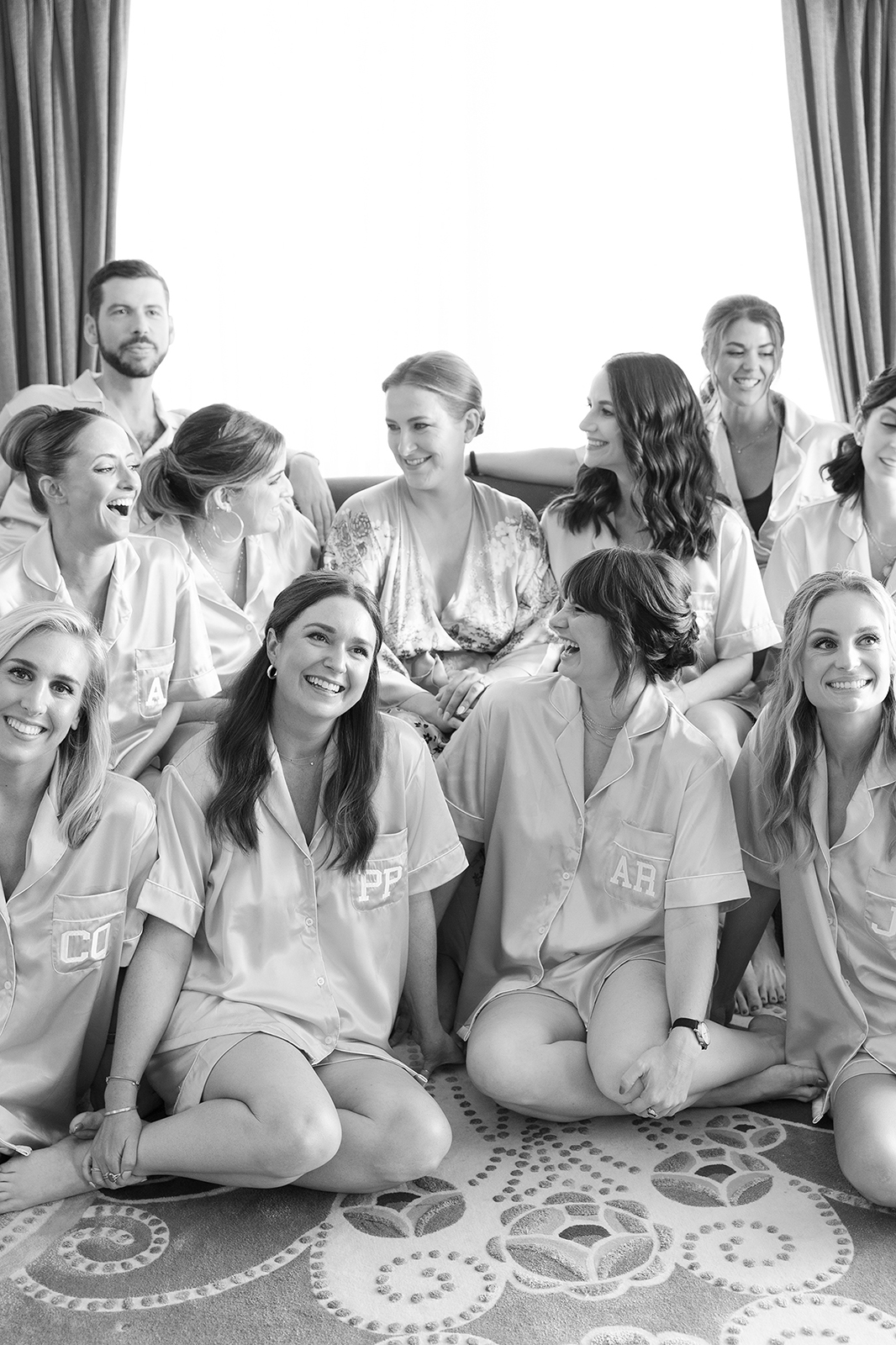 Black and white candid moment of the bride and bridesmaids getting ready at Faena Hotel Miami Beach