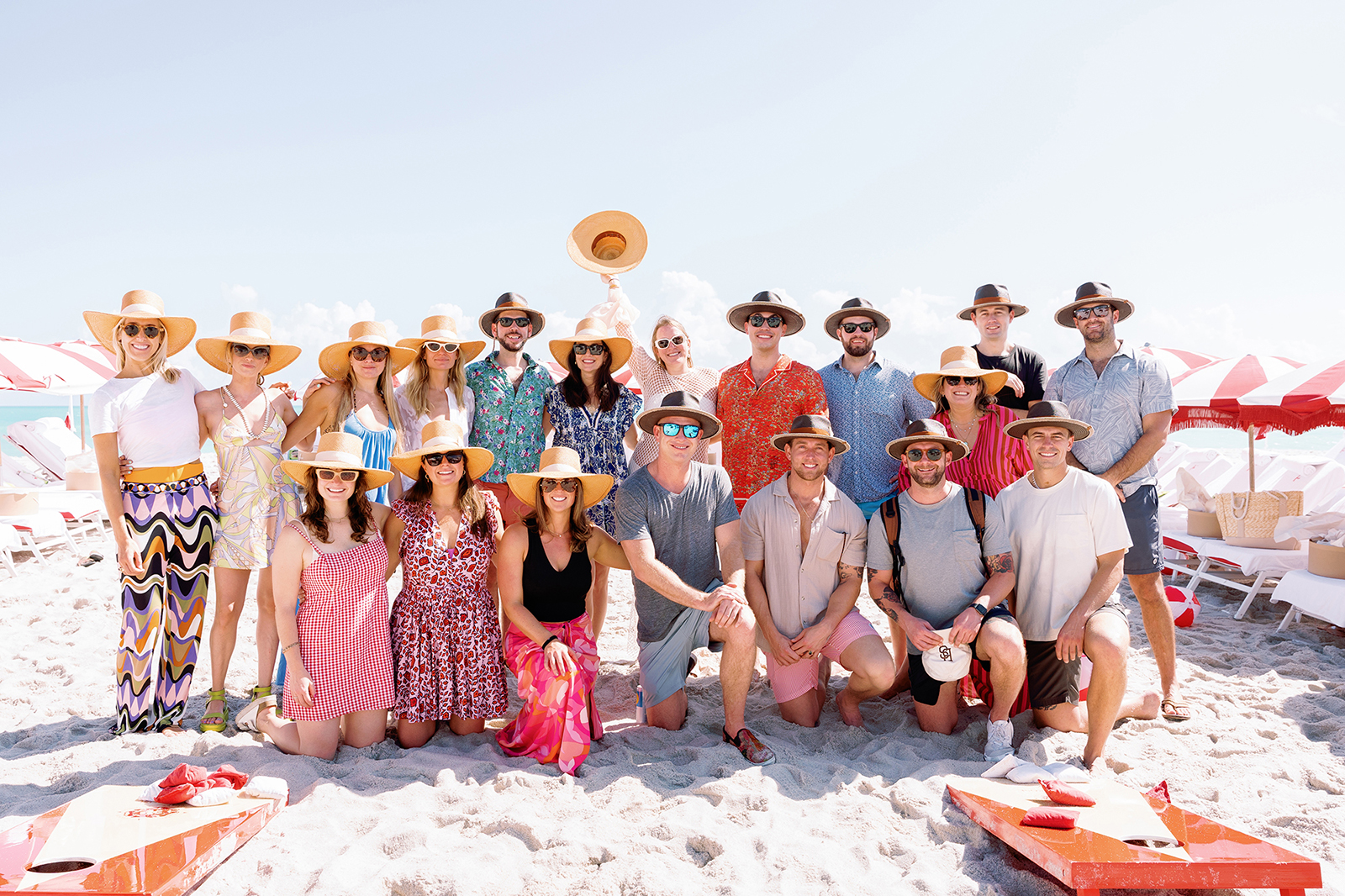 Wedding party group portrait at Faena Beach in Miami during a destination wedding weekend celebration