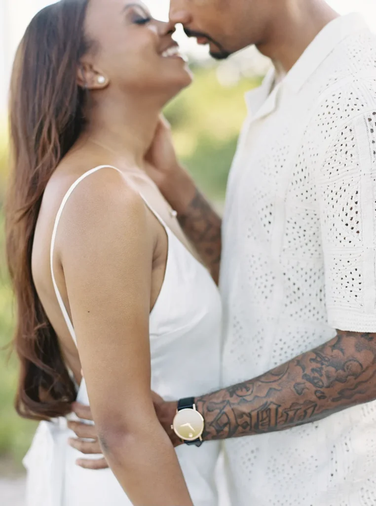 couple during sunset photos on their engagement session in key bicayne
