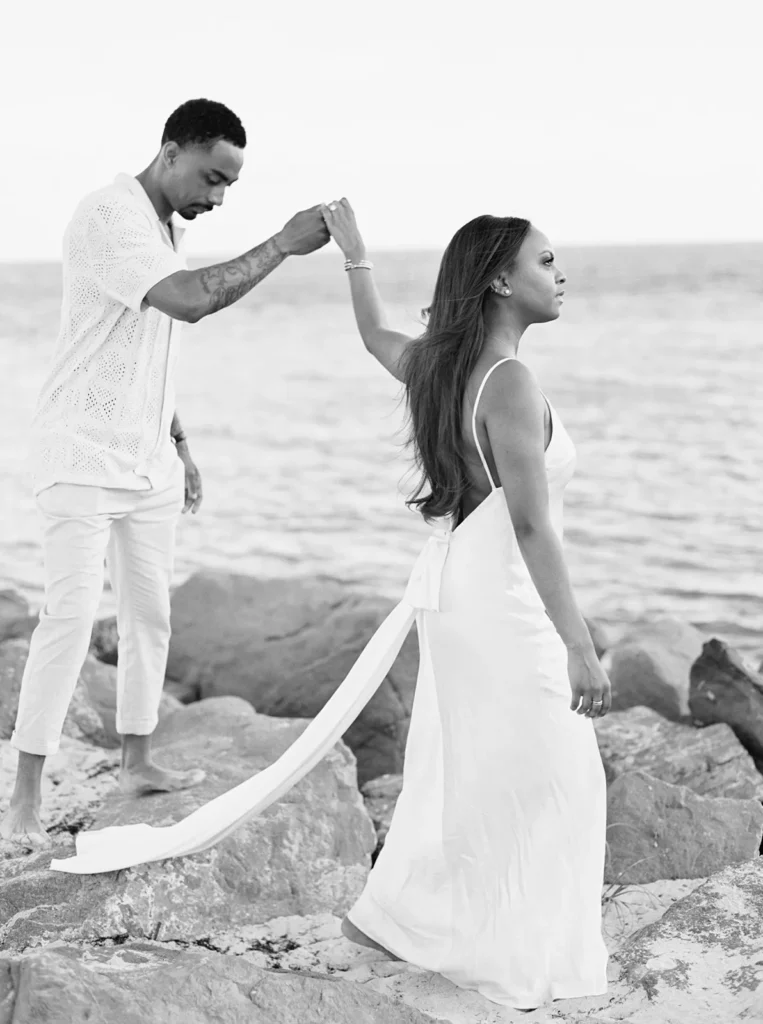 couple walking on the rocks in bill baggs state park