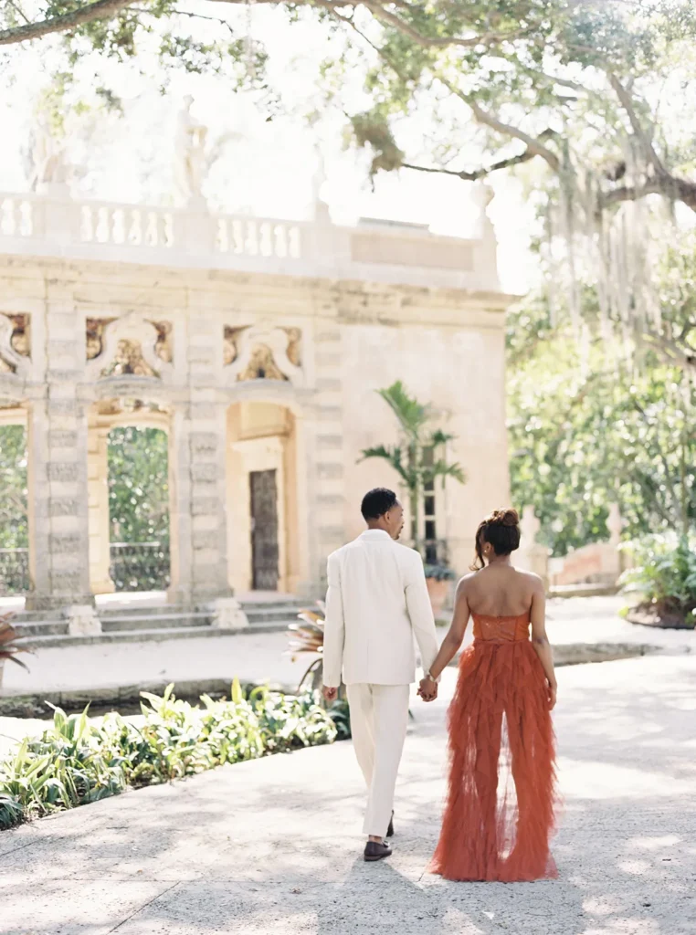 Couple walking through the garden mound in vizcaya museum