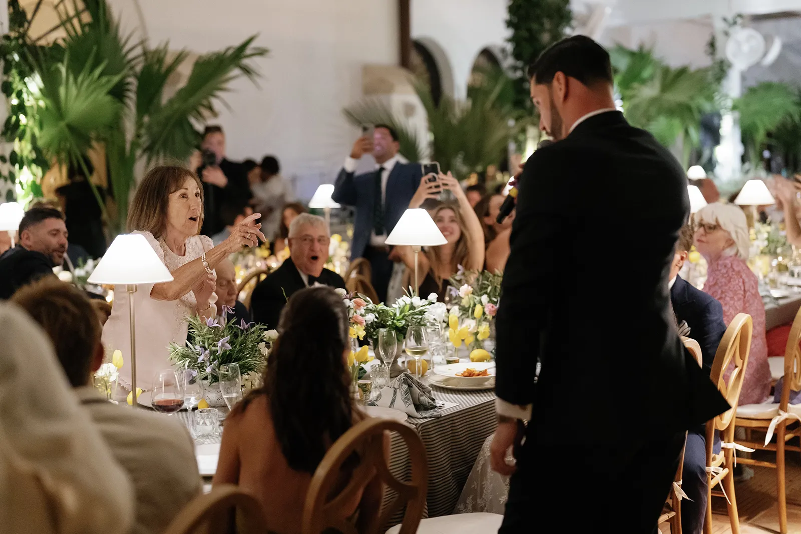 Louis amanita singing to the bride's grandmother 