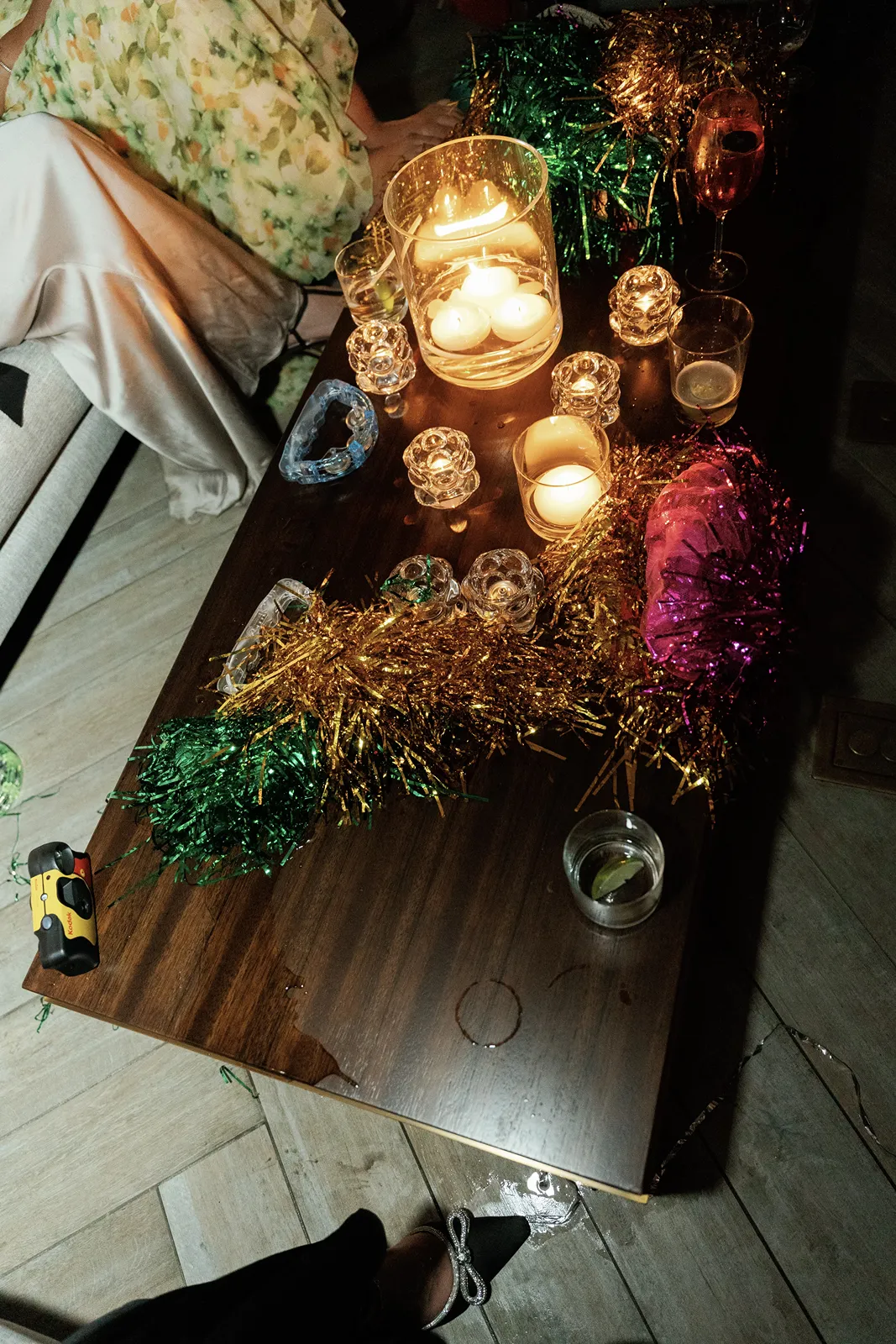 After party table with candlelight, cocktail glasses, and festive decor at an elegant wedding celebration