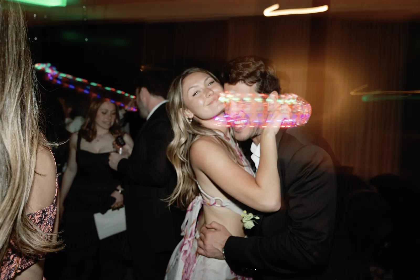 Wedding guests dancing with LED tambourines during a high-energy after party at Montage Healdsburg