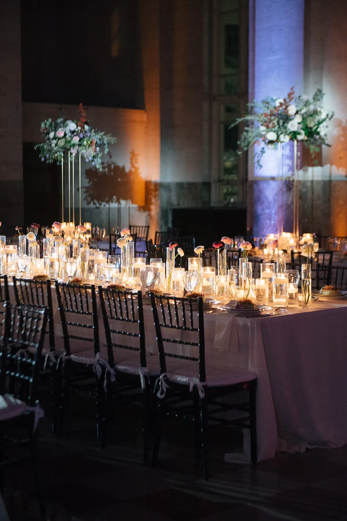 wedding reception tables and flower arrangements in the Dupont building in miami