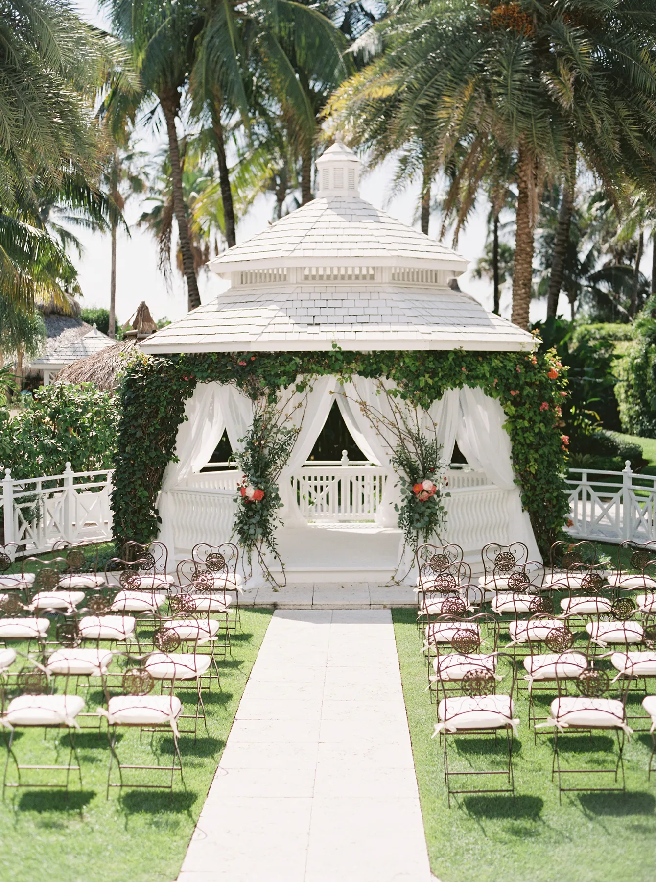 white wooden gazebo decorated for a wedding ceremony a the palms hotel in Miami Beach