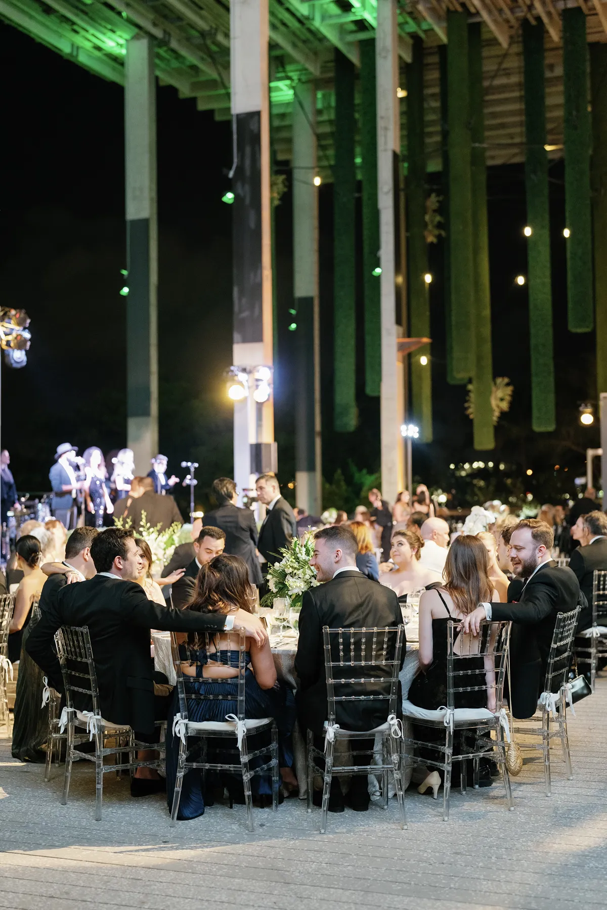 wedding guests seated during dinner in a Perez art museum wedding miami