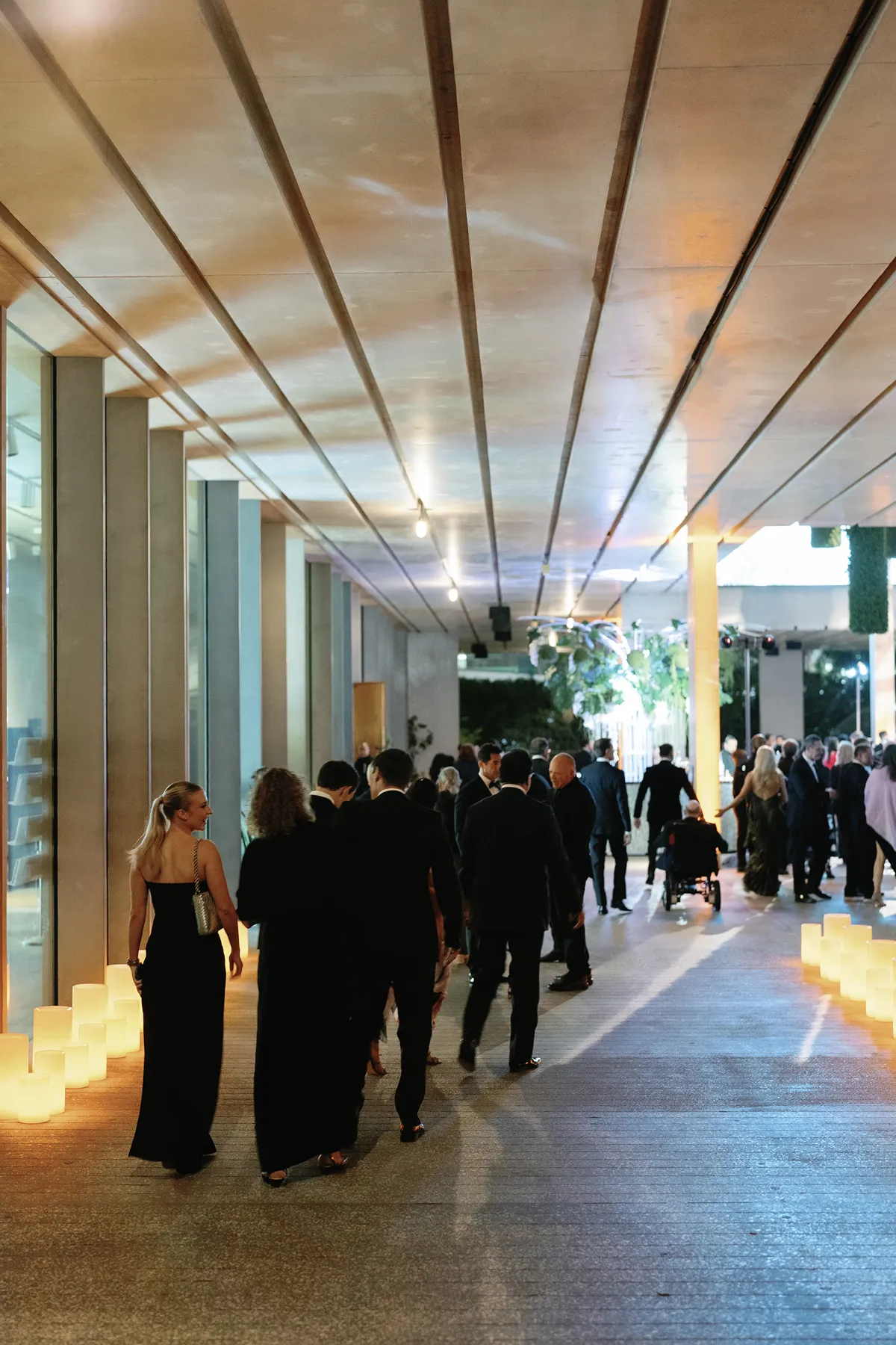 guests walking toward reception area in a PAMM wedding
